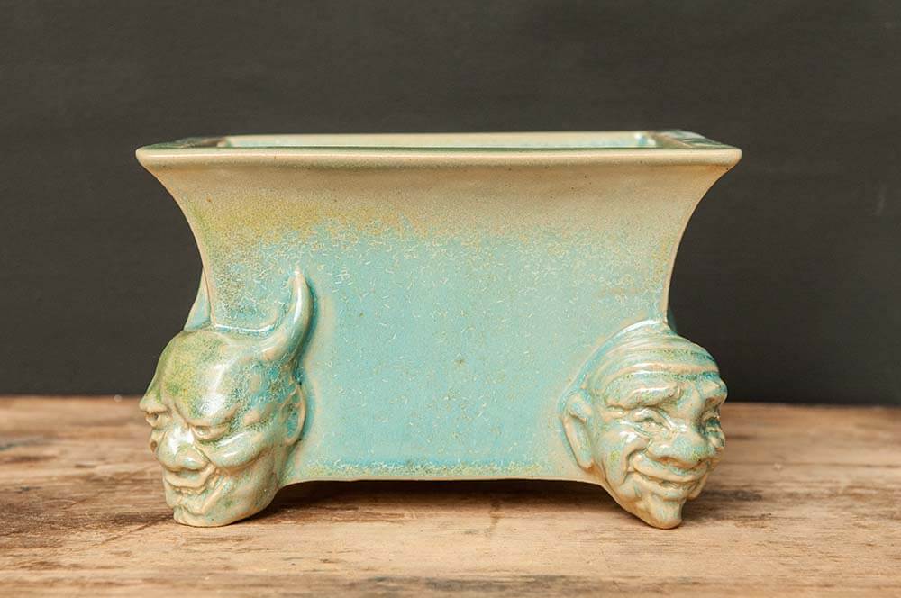 Semi-cascade pot with masks from the Noh Theatre - S 02